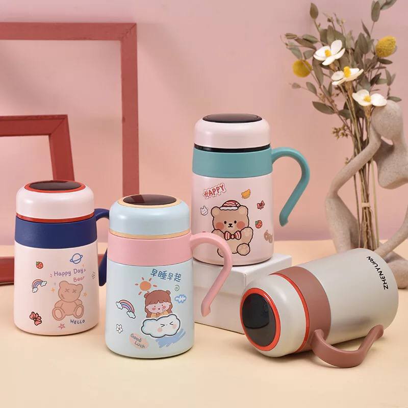 Thermal-Stainless-Steel-Mug-for-Kids-for-Hot-Drinks-500-ml_All_3918_8.jpeg مج ترمس حراري 500 ملي للحفاظ علي المشروبات ساخنة مع شاشة لعرض درجة الحرارة بيد لسهولة الحمل - الصورة 1