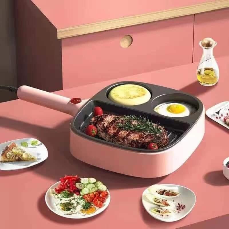 جريل-كهربائي-غير-لاصق-للأكل-3-أقسام-لقلي-البيض-وعمل-البان-كيك-وتسوية-شرائح-اللحم_All_1401_8.jpeg جريل كهربائي غير لاصق للأكل 3 أقسام لقلي البيض وعمل البان كيك وتسوية شرائح اللحم - الصورة 1