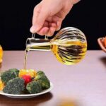 ⁦طقم زجاجات زيت وخل زجاج مع حامل خشبي للتقديم⁩ - الصورة ⁦4⁩